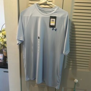 Men’s Under Armor shirt.  New With Tags.  Light Blue Size Medium.
